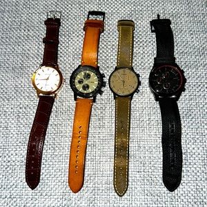 4 men watches in great condition $25 each if you buy the four